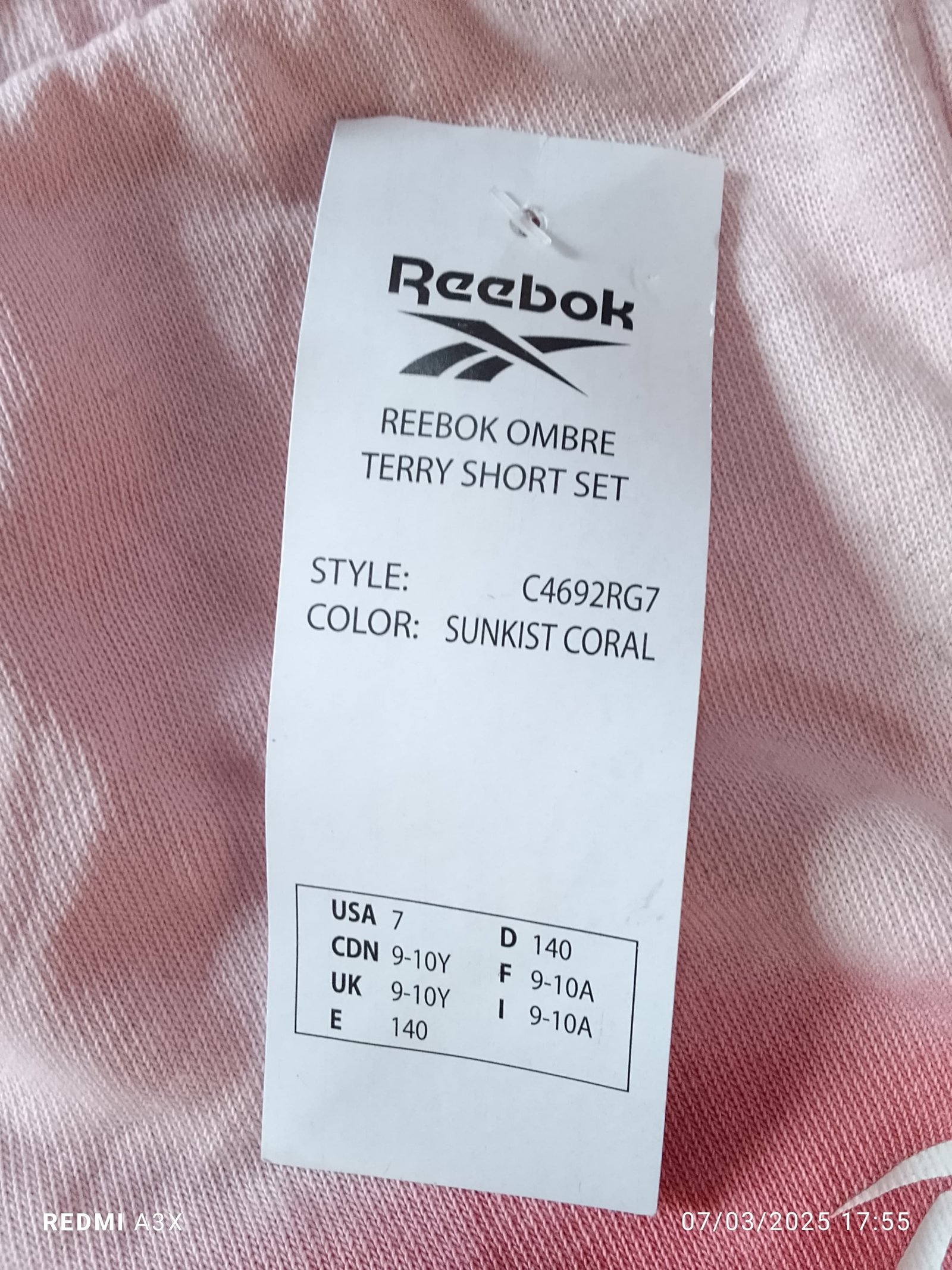 REEBOK GIRLS PREMIUM FRENCH TERRY / FLEECE ELASTIC WAISTBAND SHORTS — Label card
